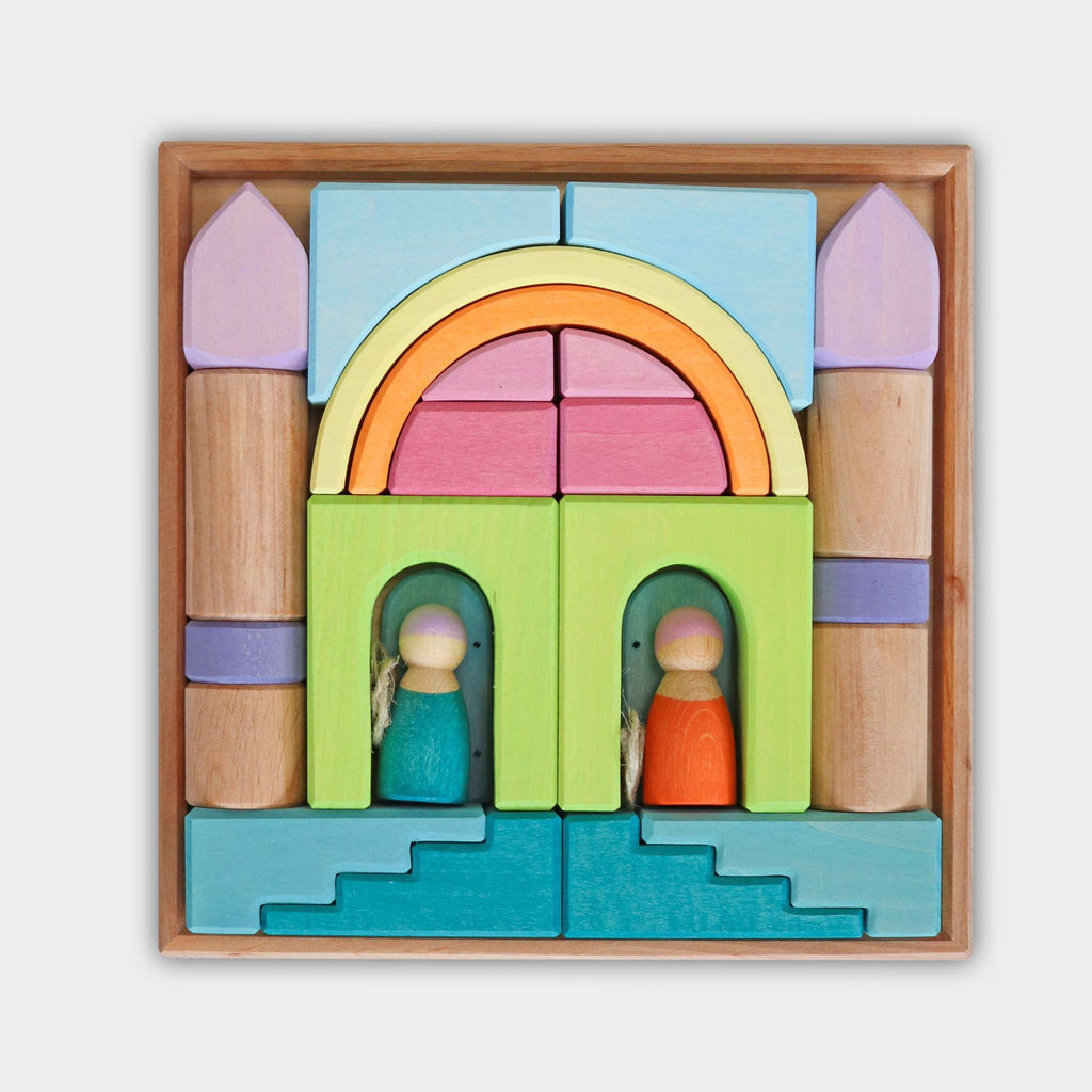 A square wooden puzzle featuring solid wood, colorful geometric pieces forming a whimsical castle. The castle has a rainbow arch at the top and two small wooden figures, one in green and the other in orange, standing in arches at the bottom. Perfect for imaginative free building, the background is white.

Grimm's Building World Cloud Play Block Set