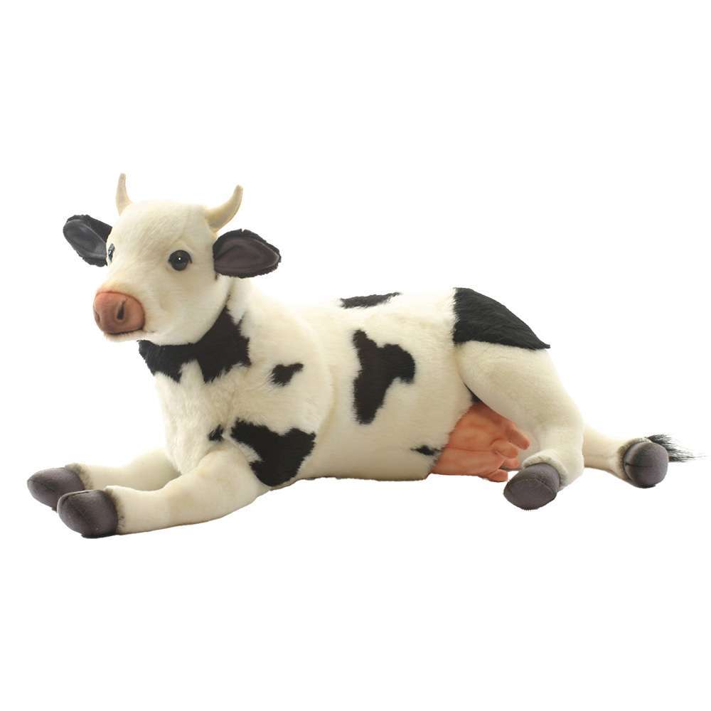 A Cow Stuffed Animal, handcrafted with exquisite detailing, is positioned on its side. This plush toy showcases the classic black and white spots of a cow, complemented by small horns and a white face featuring black ears and a pink snout. Its udders are also visible underneath. The overall design is remarkably realistic, making it a standout among similar plush toys.