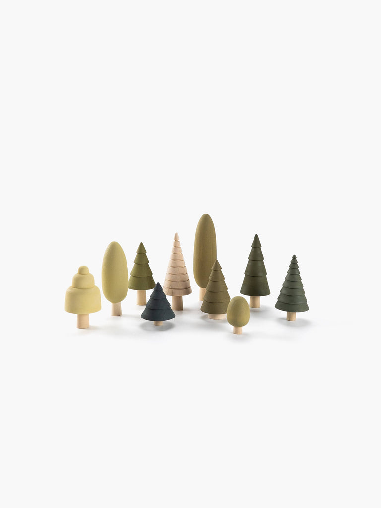 The Wooden Forest Set comprises SABO concept toys, showcasing miniature wooden trees in diverse shapes and shades of green and natural wood tones, ideal for imaginative play, all arranged on a white background.