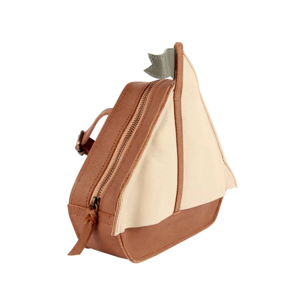 A small, novelty Boat backpack designed to resemble a fish, featuring a peach and cream color scheme with a fin detail, photographed against a white background.