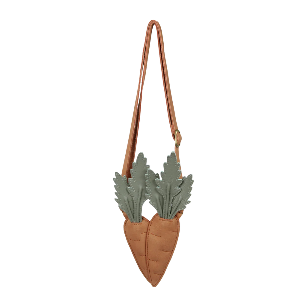 A stylish tan Donsje Chaeso Purse shaped like a heart, adorned with two large grey-green succulent plants, hanging from slender leather straps against a black background.