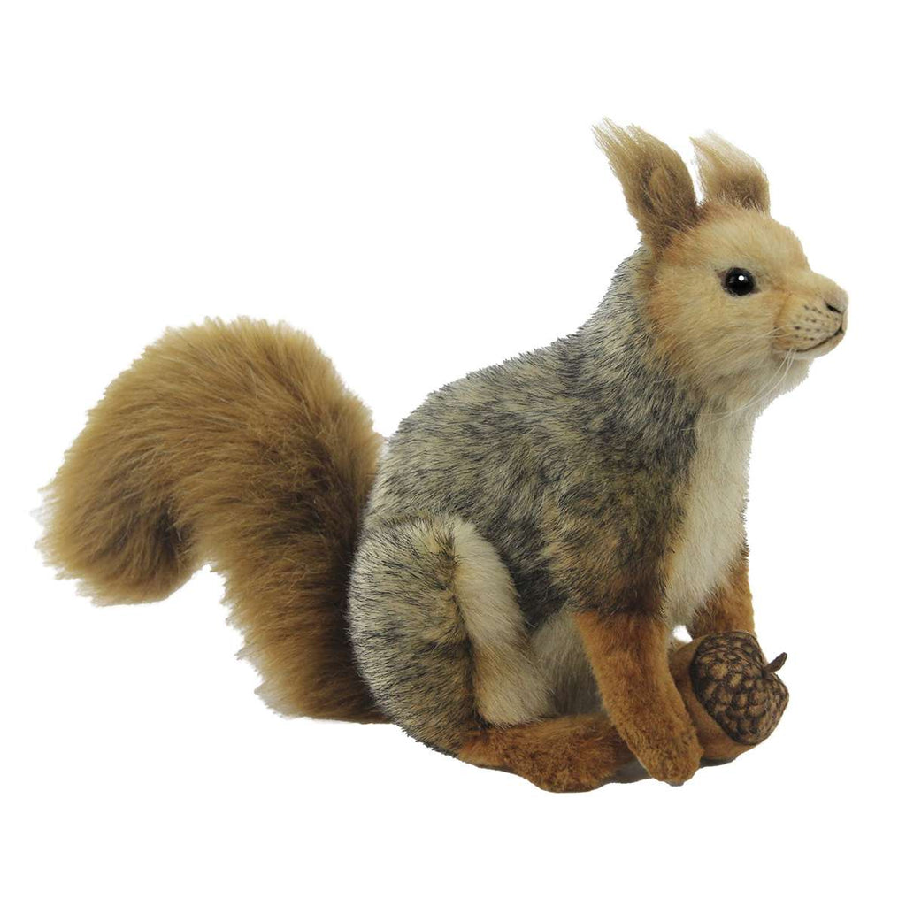 The Sitting Gray Squirrel Stuffed Animal is an artisan-crafted plush toy with realistic reddish-brown and gray fur. It sits upright holding an acorn, and its bushy tail enhances its lifelike appearance. The attention to detail highlights its unique personality, making it a charming addition to any collection.