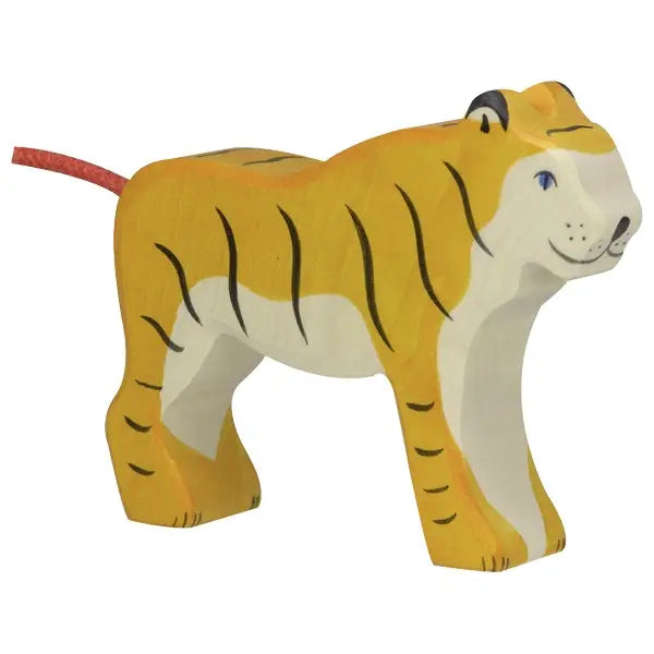 A Holztiger Tiger, Standing from the HOLZTIGER figures collection, featuring a yellow body with black stripes, white accents on the face and underbelly, and a red tail. Made in Europe with exquisite craftsmanship, the tiger stands posed with a friendly expression.