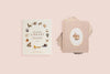 Sentence with Product Name: The Our Little Library Book Box Set is displayed against a soft pink background; featuring woodland-themed illustrations, and an oval inset of a rabbit.