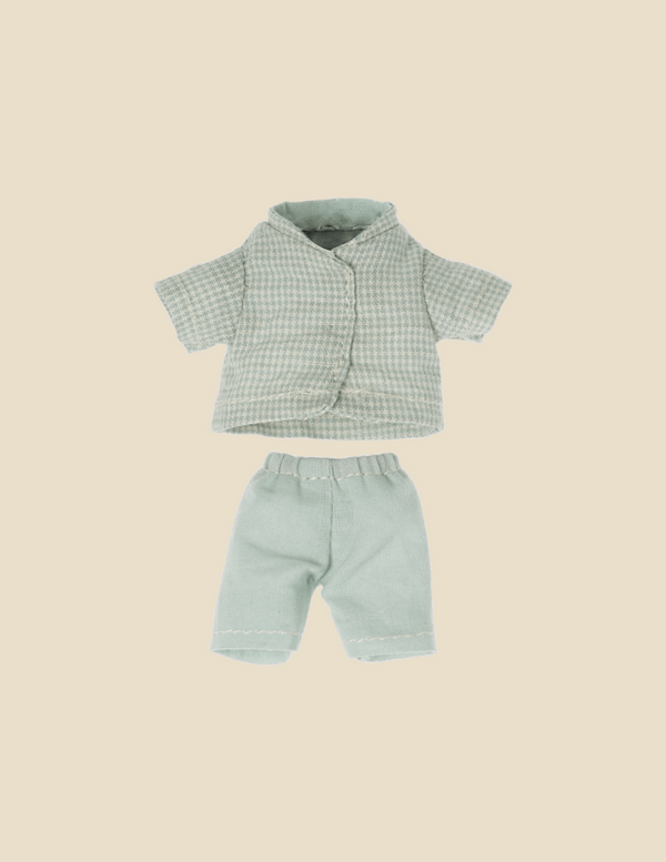 The Maileg Extra Clothing: Pajamas for Little Brother Mouse set features a two-piece doll outfit with a short-sleeve button-up shirt in a checkered pattern and knee-length shorts, both crafted from light green cotton fabric. Displayed against a beige background, this outfit is perfect for your little brother mouse's next pyjama party.