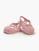 A set of Minikane Beach Sandals in Petal Pink, designed for children with a small, closed-toe design and multiple straps. Made from soft, flexible material, these doll accessories are displayed with one sandal slightly overlapping the other on a white background.