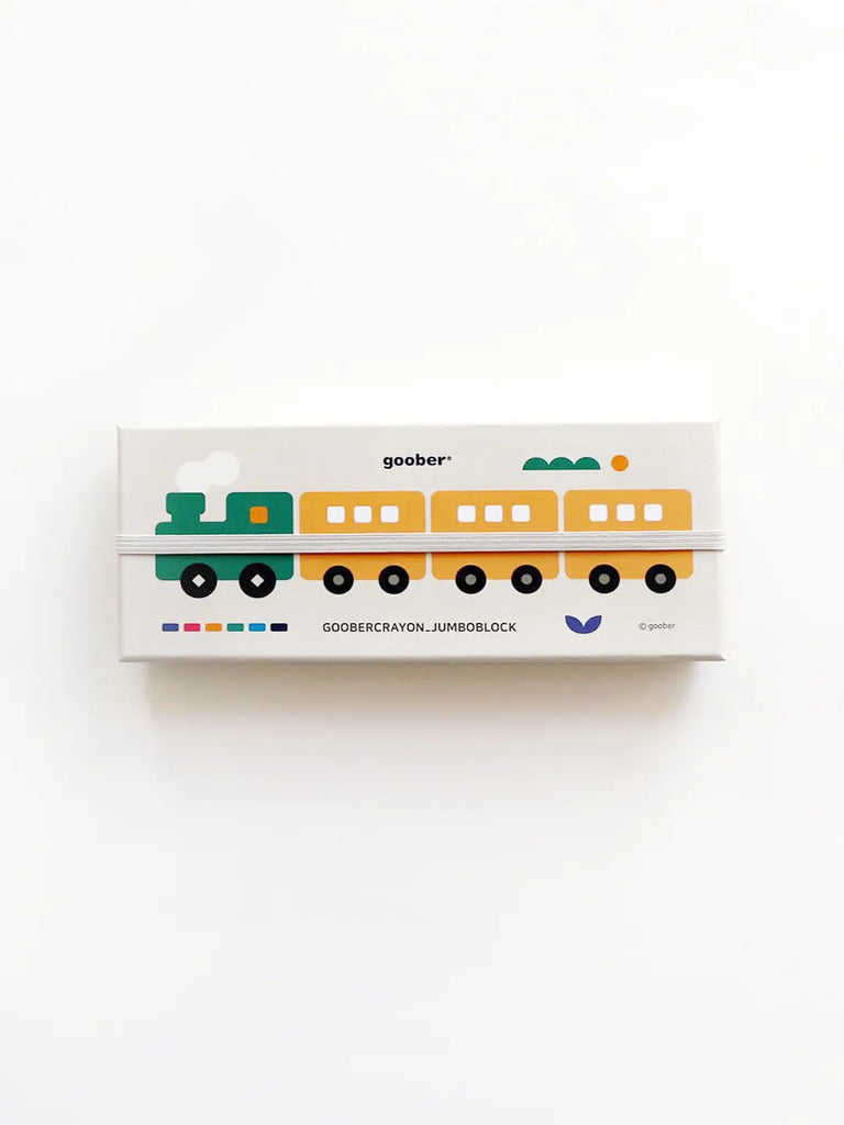 A light gray crayon box with a colorful illustration of a toy train on it. The train has a green engine and three yellow carriages. Below the train, there are colorful images of Jumbo Block Crayons made with non-toxic pigments. The word "goober" is printed at the top.