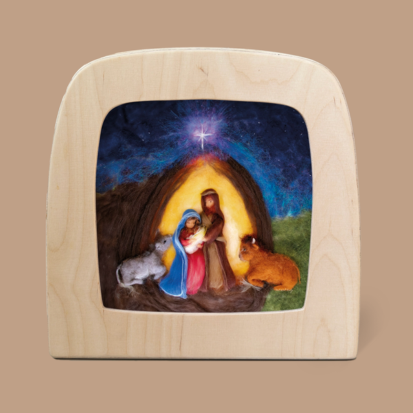 This charming home decor piece, named "Silhouette Only - Christmas Miracle," depicts a Nativity scene with Mary, Joseph, and baby Jesus under a star-lit sky. The wooden plaque is designed in a felted wool style, showcasing the stable setting complete with a donkey and cow to capture the moment's magic. It ships in approximately one week.