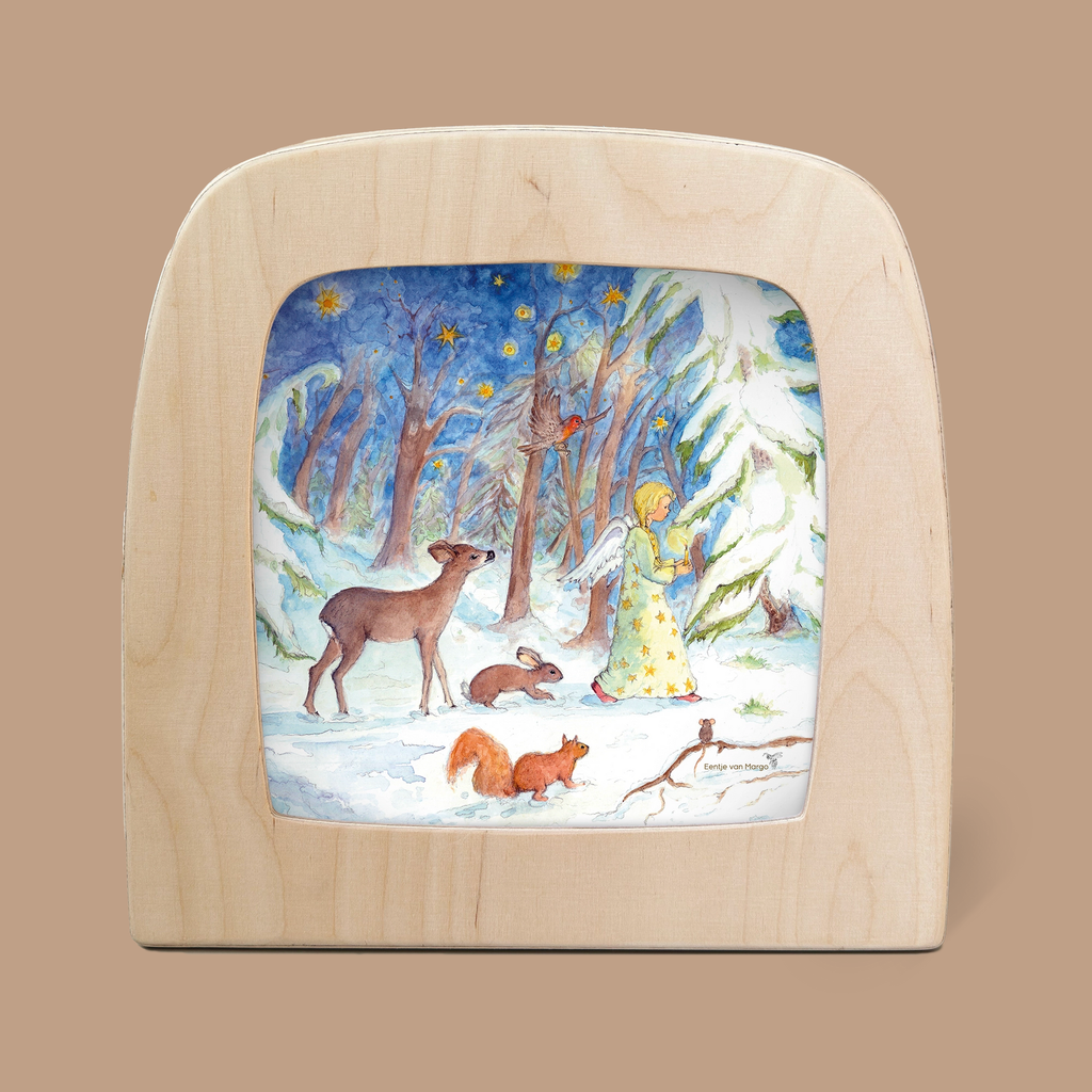 The "Silhouette Only - Winter Forest for Toverlux Lamp" showcases a captivating scene of a winter forest, where a woman in a yellow robe holding a lantern is surrounded by wildlife—namely, a deer, rabbit, and squirrel. They inhabit the snowy landscape beneath twinkling stars, bringing the magic silhouettes to life.