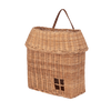 The Olli Ella Hanging Rattan Basket Hutch is a wicker picnic basket crafted to look like a house, complete with a roof-shaped top and a charming small window detail on the front. This handcrafted rattan storage piece also features an easy-to-carry handle.