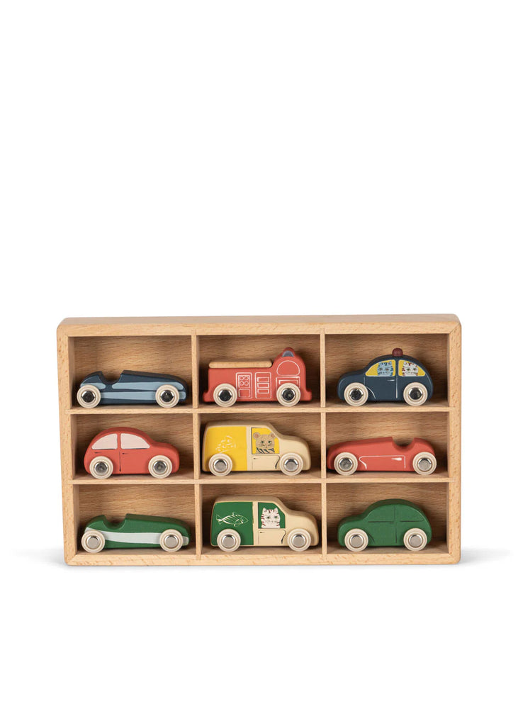 The Konges Sløjd Wooden Mini Car Set, which ships in approximately one week, features ten vibrant mini cars, trucks, and buses. These FSC™-certified wooden toys are neatly housed in a beechwood box with nine compartments. Each vehicle is uniquely painted with intricate designs, bringing charm and delight to playtime.