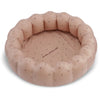 An Inflatable Large Shell Pool - Cherry Blush, boasting a round shape and a beige hue, features small pattern designs and resembles an inflatable pool with a cushioned border. The center of the bed displays the text "on the sunny side." This soft and comfortable accessory is ideal for small pets.