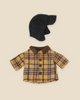 The Maileg Extra Clothing: Woodsman Jacket and Hat for Teddy Dad is featured on a beige background, showcasing a small plaid yellow and brown jacket with a dark brown collar paired with a dark wool hat complete with ear flaps, creating a cozy ensemble. Each item can be purchased separately.