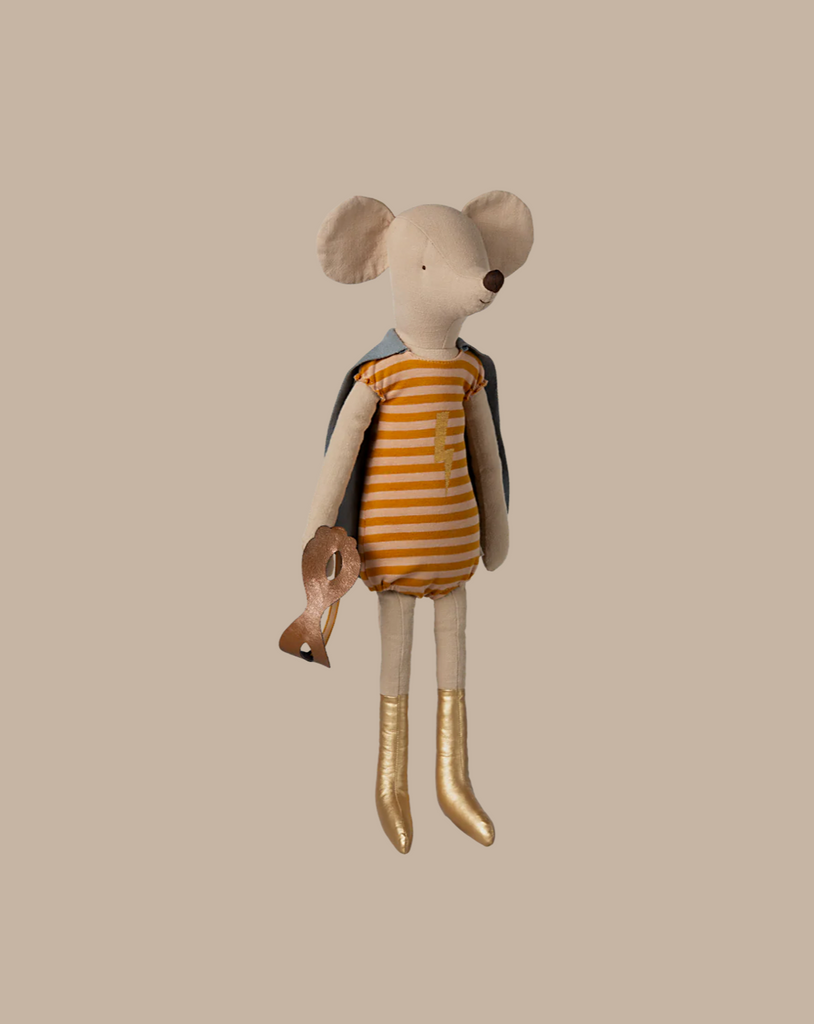 The Maileg Superhero Mouse, Maxi - Girl is a plush toy dressed in a striped orange and white superhero outfit, complete with golden boots. It has charming rounded ears and carries a small brown bag, striking a heroic pose against a plain beige background.