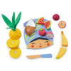 Colorful Tropical Fruit Chopping Board set featuring a face shaped as a plate surrounded by tropical themed fruit pieces like banana, pineapple, dragon fruit, apple, and watermelon, with a wooden knife included for easy cutting.