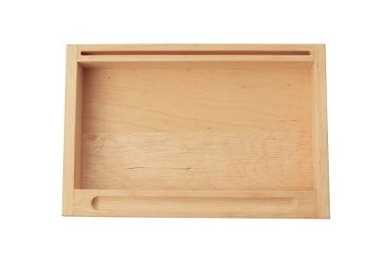 The Sand Tray with Flash-Card Holder, a rectangular wooden tray, boasts a shallow groove along one shorter side and another along one longer side. With its smooth surface and natural wood grain finish, it's an ideal educational toy for developing writing skills.