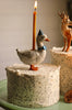 Goose in a party hat candle holder