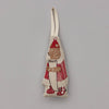 The North Pole Bear Ornament is designed as a bear wearing a festive red and white outfit with a hat, holding a scroll. It includes a loop at the top for easy hanging, making it an ideal addition to enhance the charm of your Christmas tree. The ornament is set against a plain gray background.