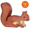 Description: A Holztiger Squirrel, Standing handcrafted wood toy squirrel with a reddish-brown body and a cream-colored belly. It has a thick, bushy tail and detailed facial features. A round orange sticker in the top right corner reads "spiel gut recommended" with German text beneath it, marking it as one of HOLZTIGER figures made in Europe.