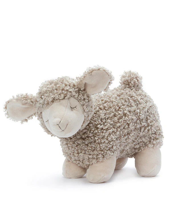 Introducing Charlotte the Sheep Stuffed Animal, a soft, plush toy shaped like a lamb with curly, light beige fur. Her floppy ears and serene, closed eyes give her that irresistible sleepy sheep charm. With a round cuddly body and four short legs, she promises comfort and is easy to care for with a gentle machine wash.