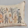 Decorative Halloween Full Moon Masquerade pillow featuring embroidered designs of five children in animal-themed costumes, such as a rabbit and bear, with trees and birds under a silver moon on beige fabric.