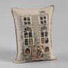 The Haunted House Pocket Pillow showcases an embroidered haunted house design complete with window scenes of skeletons, pumpkins, and a costumed witch. Adorned with spider webs and featuring a small spider on the rooftop, this pillow's beige fabric creates the perfect ambiance for your Halloween celebration.