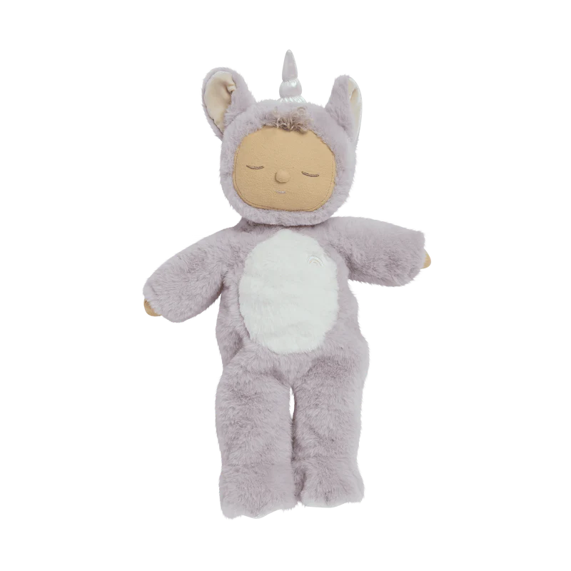 The Olli Ella Cozy Dinkum Doll Unicorn - Sweetpea is a plush doll in a gray animal-themed outfit featuring fluffy ears, a shimmering horn, and a white belly patch. It has soft lavender fur, sparkling wings, and an embroidered serene face with closed eyes.