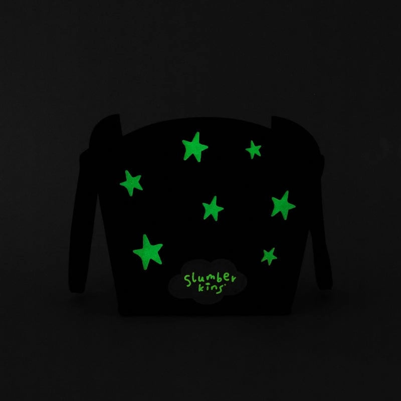 A black eye mask with glow-in-the-dark green stars and the text "Slumberkins Halloween Gift Set - Mummy Kin + Halloween Fright Book" visible against a dark background, perfect for an eco-friendly Halloween product.