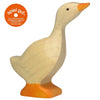 A Holztiger Goose, Small with an orange beak and feet, standing upright. The toy is light in color and has simple features, reminiscent of HOLZTIGER figures. A circular orange seal in the top left corner reads "spiel gut" and indicates a recommendation for children's play toys. Made in Europe.