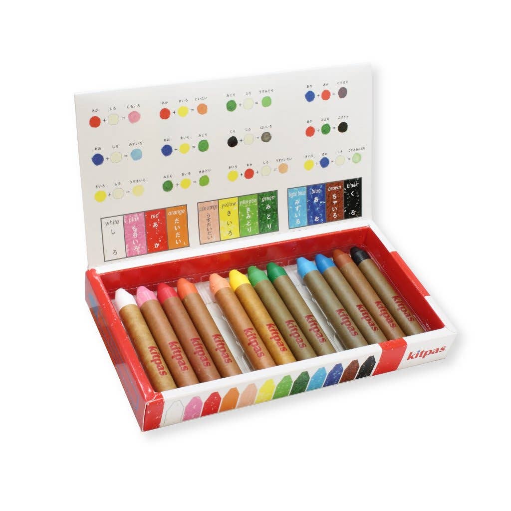 A box of Kitpas Crayons - 12 Colors offers a vibrant display of shades, with the lid adorned by color labels and swatches. These non-toxic crayons are neatly arranged and ideal for both drawing and watercolor painting, showcasing their vivid hues.