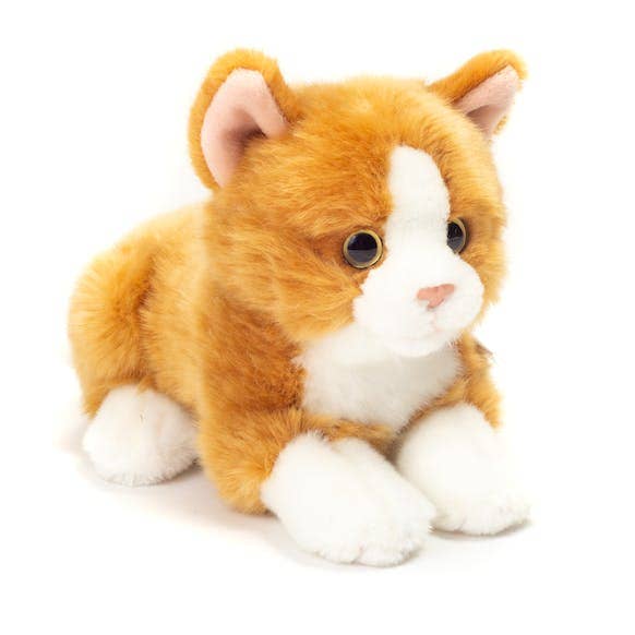 The Teddy Hermann Orange Laying Cat Stuffed Animal from the Hermann Teddy Collection is a high-quality plush toy that resembles an orange and white tabby cat. It features realistic details, including pink inner ears and expressive black eyes, and is posed lying down with its legs tucked under its body.