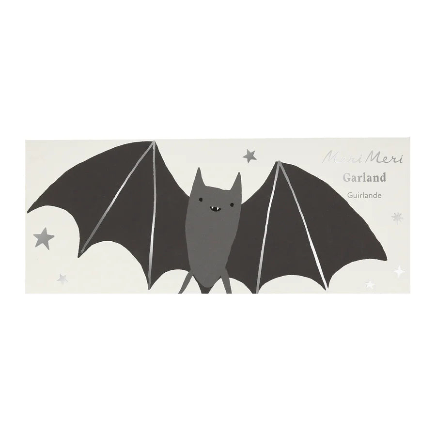 A flat design image features a cute grey bat with outstretched black wings. Set against a light background with small stars scattered around, this perfect Halloween decoration includes the text "Meri Meri Bat Garland - Final Sale" in the top right corner.