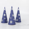 Three blue Meri Meri Wizard Party Hats & Wands with silver star and crescent moon patterns scattered across their surfaces, perfect for any wizard-themed party. Positioned against a plain white background, one hat features an elastic strap at the bottom to hold it in place when worn.