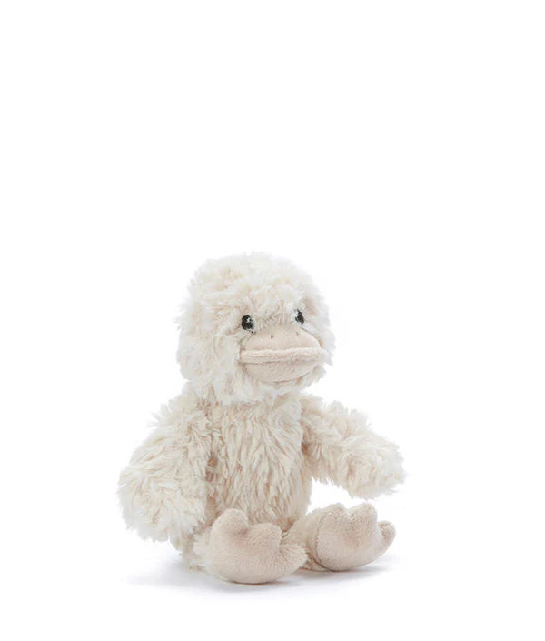 The Mini Bill the Duck Rattle is a small, plush duck toy with white, fluffy fur and a cream-colored beak and feet that sits upright against a plain white background. Its soft texture and stitched eyes give it a cozy and cuddly appearance, while the built-in rattle makes it perfect for action-reaction learning with babies and toddlers.