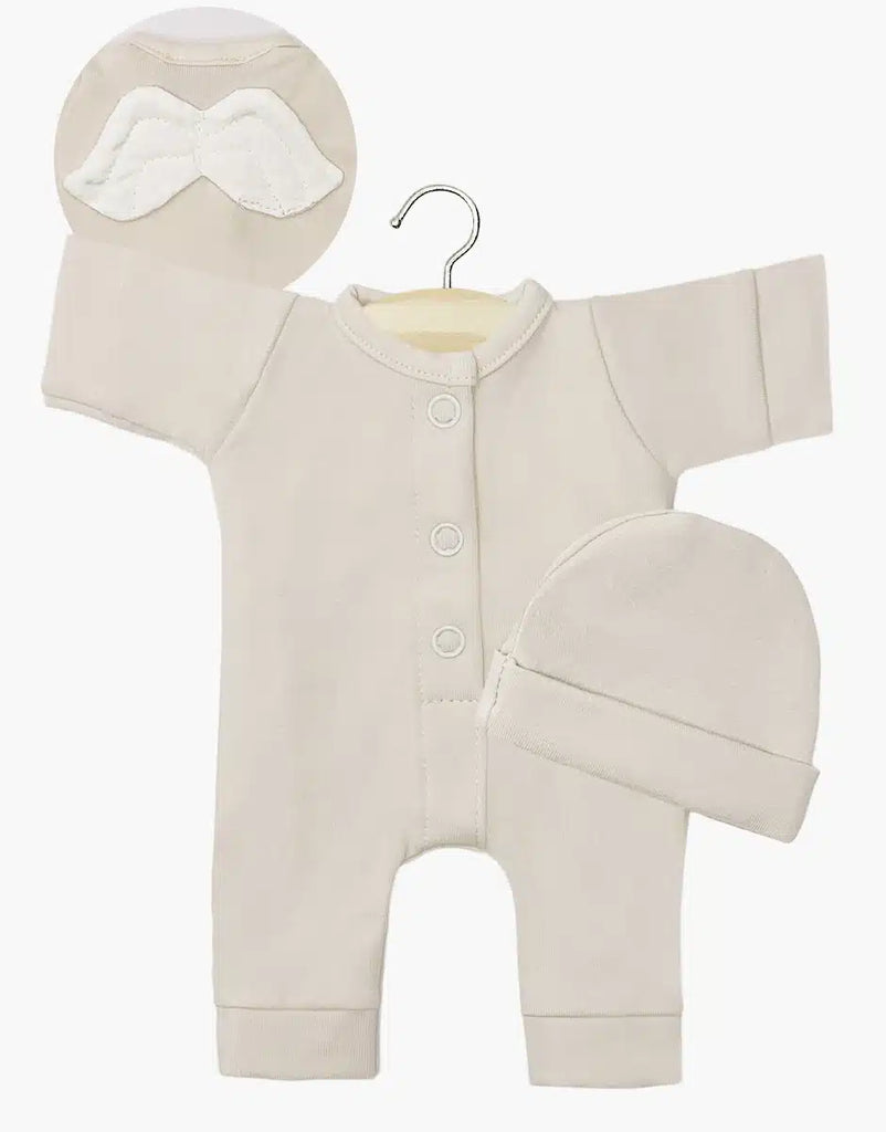 The "Little Angel" linen jersey set by Minikane offers a beige baby onesie with long sleeves and button closure, complete with a matching beanie. Presented on a hanger, an inset image showcases charming white wings adorning the back.