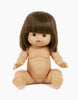 A Minikane Baby Doll (13") - Chloe with short, straight brown hair and bangs, rosy cheeks, a slightly open mouth, and chubby limbs is seated on a white background. The anatomically correct doll is unclothed and has realistic detailing on its hands, feet, and facial features.