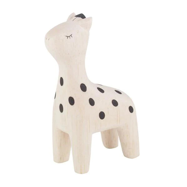 A light-colored, handcrafted Albizia wood figurine with black spots and a simple, minimalist design. The giraffe has closed eyes represented by two curved lines and a small black tuft on its head. Standing on four legs with a gentle, upward-facing head, it epitomizes charm in **Handmade Tiny Wooden Safari Animals - Giraffe**.