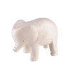 A small, light-colored Handmade Tiny Wooden Safari Animals - Elephant with simple, minimalist features stands on a white background. The handcrafted wooden animal has a smooth texture and faint lines etched to represent details. Its trunk is slightly lifted, and it has a small painted eye.