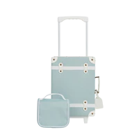 Transparent acrylic bird feeder with a light blue back panel, designed for window mounting, featuring multiple perches and seed holders for your Olli Ella See Ya Wash Bag - Steel Blue buddy.