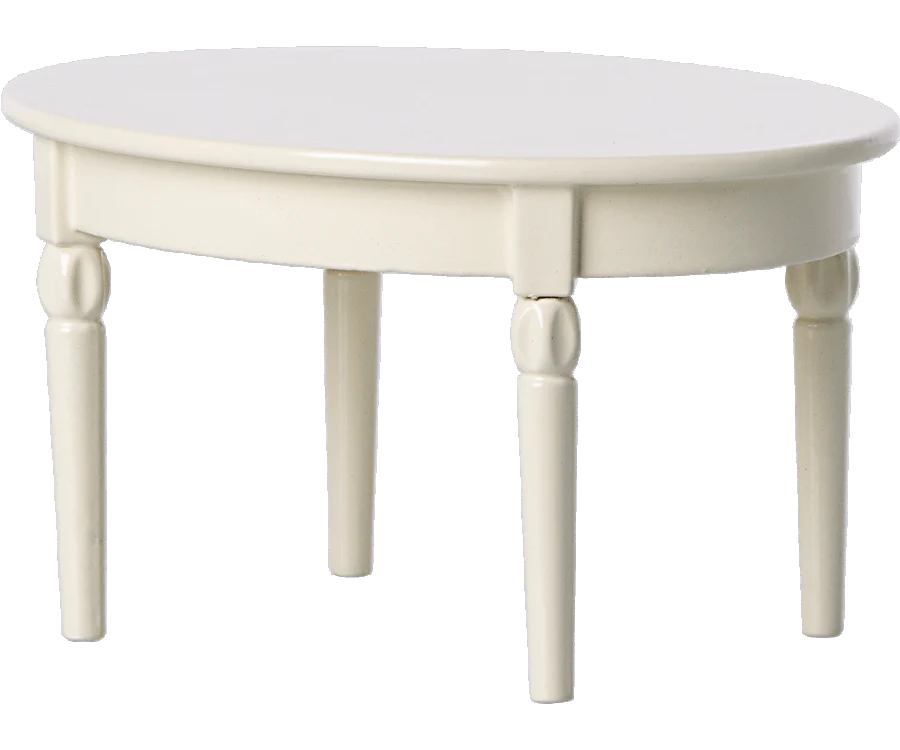 A simple, round, cream-colored Maileg Miniature Dining Table with four slightly tapered legs, presented on a white background.