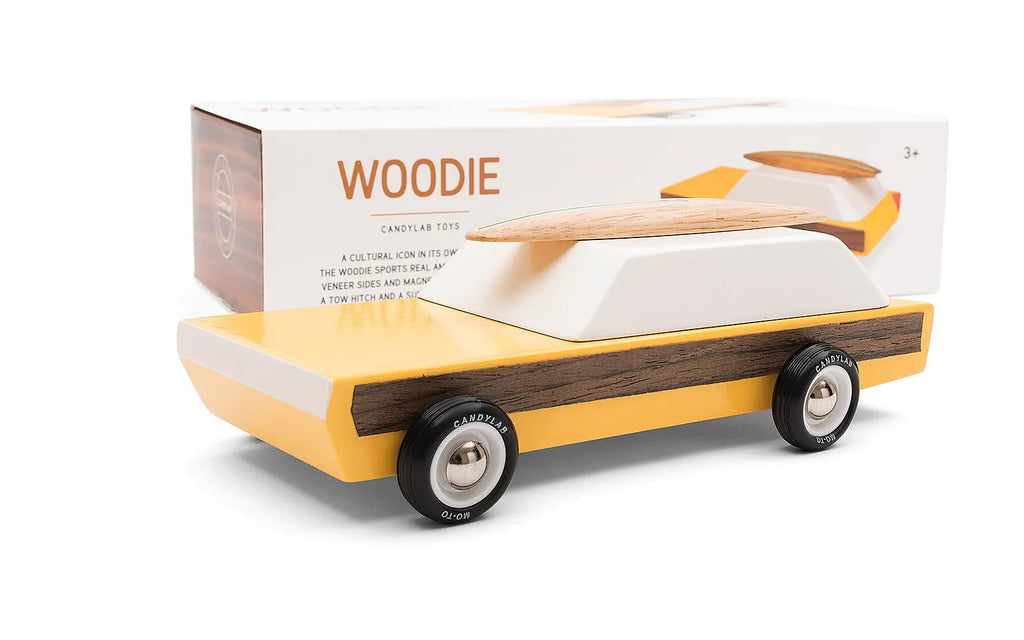 wooden car toy with surfboard