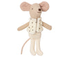 The Maileg Little Brother Dancer Mouse in a Box features a whimsical beige fabric mouse standing with its arms outstretched. It wears an adorable white furry vest adorned with black dots, and its long tail gracefully hangs down. The mouse boasts large, round ears, a stitched nose, and simple detailing that adds to its charming appearance.