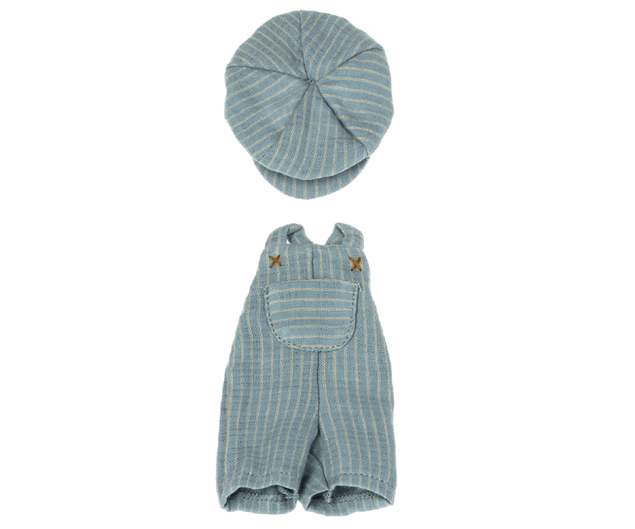 The Maileg Extra Clothing: Overall and Cap for Teddy Junior is a charming small outfit that includes a blue, white-striped overall and a matching newsboy cap. The overall is adorned with a front pocket and brown button details. Perfect as an ideal coordinated set for a baby or doll, each piece can also be purchased separately.