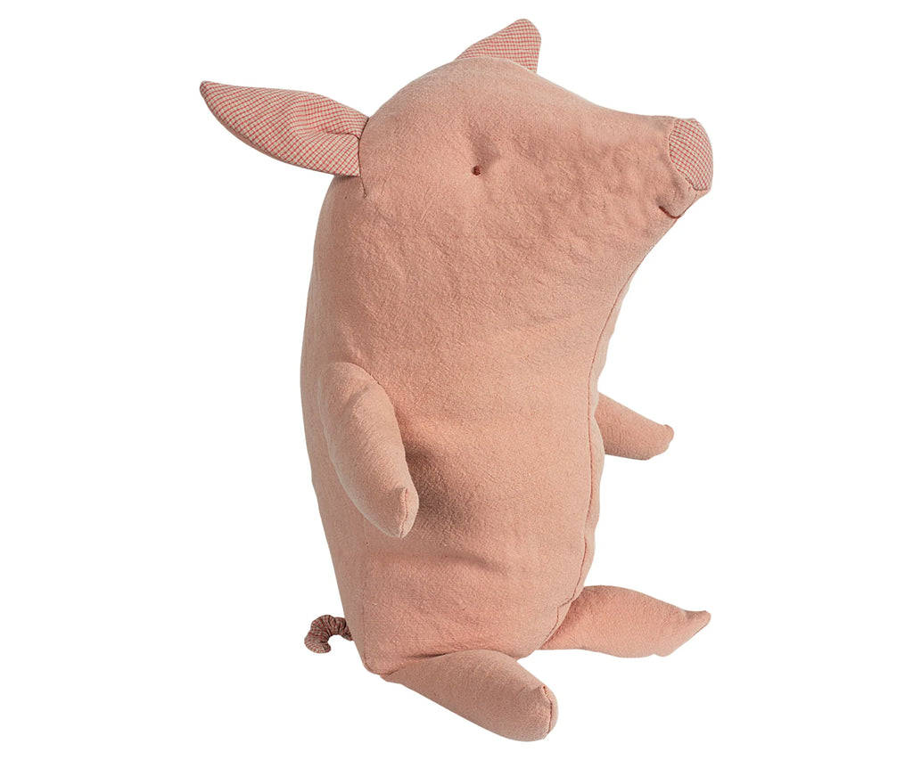 Maileg Truffles the Pig, Baby, is the cutest pig with a soft pink body, small round ears, and a curly tail. Sitting upright with its limbs slightly extended, Truffles is made from smooth recycled polyester fabric and features a cute, minimalistic design.