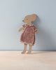 A cardboard cutout of a mouse stands upright against a light blue background. The mouse is dressed in a charming Maileg Knitted Dress For Mum Mouse, accentuating its minimalistic and delightful design.