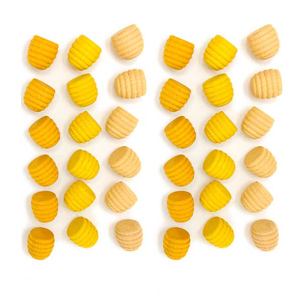 An image displaying an assortment of yellow and orange ridged potato chips arranged in a Grapat Mandala Honeycomb pattern on a white background.