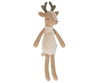 A small deer stuffed animal with antlers photographed on a flat background.