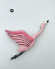 A Hanging Felt Flamingo, crafted from organic wool with detailed wings and black accents on its tail and beak, is shown against a plain white background. The pink flamingo is positioned as if in flight, and a small loop is attached to its top, likely for hanging.