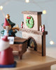 Christmas themed music box with Santa and elves playing music