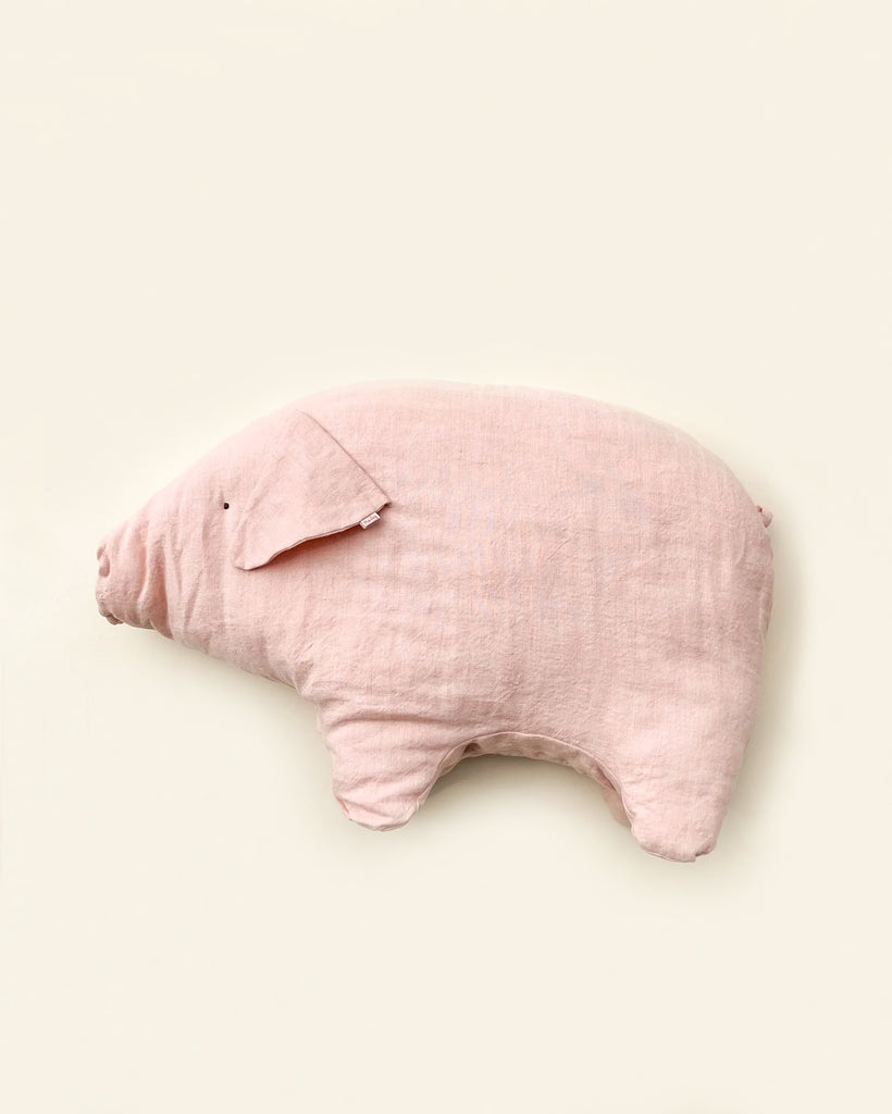 Introducing Maileg Large Polly Pork, a soft, light pink stuffed animal in the shape of an irresistibly cute pig. With minimal details for the nose, eyes, and ears, it stands on four stumpy legs with a rounded body and a slightly pointed snout. The perfect companion against a plain, light background.